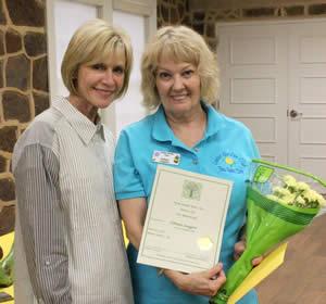 (Left) Jackie Hancock present Doggett with lifetime membership award for District III, Texas Garden Clubs.