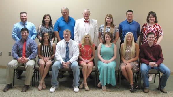 From Left: (front row, seniors) Adam Mason, Chloe Brown, Tristen Hairgrove, Kaitlyn Gates, Grace Owen, Annabeth Vaughn and Colby Ward (back row, teachers) Wade Lawson, Wanda Scruggs, Coach Pollard, Ronnie Wolfe, Amanda Russell, Steven McCann and Lynn Silvey